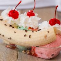 Banana Split Delight · Choice of any three scoops, with any three toppings-pineapple, strawberries, nuts, sprinkles...