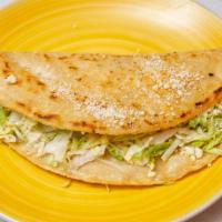 Quesadillas de Maiz · 2 handmade tortillas filled with cheese and topped with lettuce, sour cream, salsa verde, an...