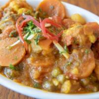 7. Kathmandu Specialty · Vegan. Thick curry made with nineteen varieties of beans. Cooked in fresh tomato, cilantro, ...