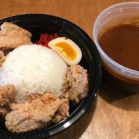 Chicken Karaage Curry · boneless fried chicken, half-boiled egg, red pickles and rice. curry sauce side.
