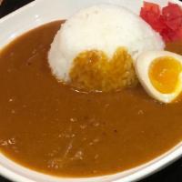 Original Curry · vegetarian curry rice with half-boiled egg and red pickles.