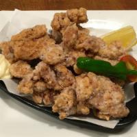 Chicken Karaage · 8pcs boneless fried chicken with side of Japanese mayonnaise, sliced lemon and tomato