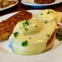 Classic Benedict · Grilled ham steak, poached eggs and hollandaise on an English muffin.