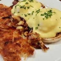 Bronx Benedict · Corned beef hash, poached eggs and hollandaise on an English muffin.