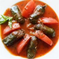 #5. Dolmeh · Stuffed grape leaves with rice, spices, special sauce, wrapped to perfection.