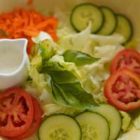 #12. Garden Salad · A fine blend of fresh tomatoes, carrots, cucumbers and lettuce with our delicious house ranc...