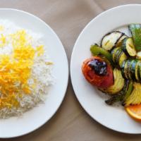 #54. Vegetarian Kabob with Basmati Rice · Charbroiled mushrooms, onions, zucchini and bell peppers.