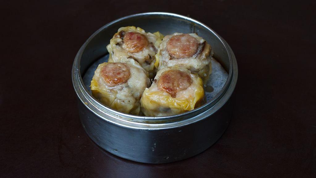 Pork Siu Mai · Pork, shrimp, and shiitake mushrooms in wonton skin.