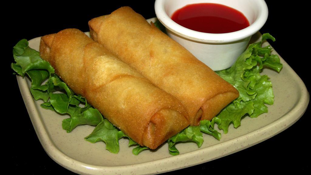 Egg Rolls · Chicken, shrimp, and cabbage wrapped in a thin pancake and deep-fried to a crisp.
