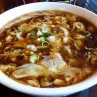 Hot and Sour Soup · Chicken, bamboo shoots, wood ear mushrooms, and egg in hot and sour chicken broth.
