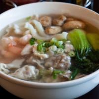 Wor Wonton Soup · Pork dumplings, chicken, calamari, shrimps, bok choy, and mushrooms in chicken broth.