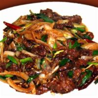 Mongolian Beef · Sautéed beef with onions and scallions in hoisin sauce.