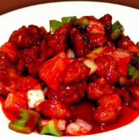 Sweet and Sour Pork · Crispy pork, bell peppers, onions, and pineapple in sweet and sour sauce.