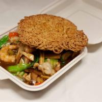 Hong Kong Pan-Fried Noodle · Sautéed shrimp, calamari, chicken, and assorted vegetables over crispy pan-fried noodles.