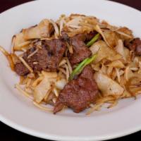 Beef Chow Fun · Stir fried chow fun noodles with bean sprouts, onions, and scallions with beef.