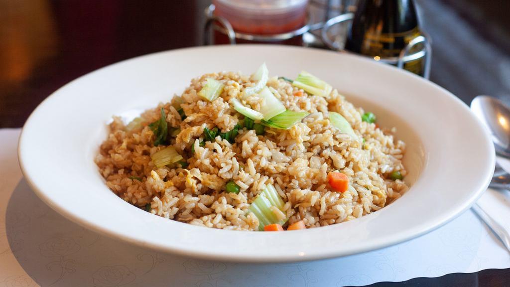 Vegetable Fried Rice · Stir fried rice, egg, scallions, peas, and carrots with vegetable.