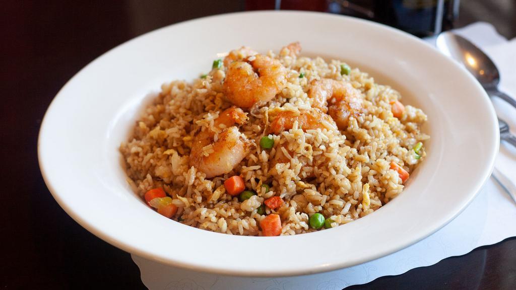 Shrimp Fried Rice · Stir fried rice, egg, scallions, peas, and carrots with shrimp.