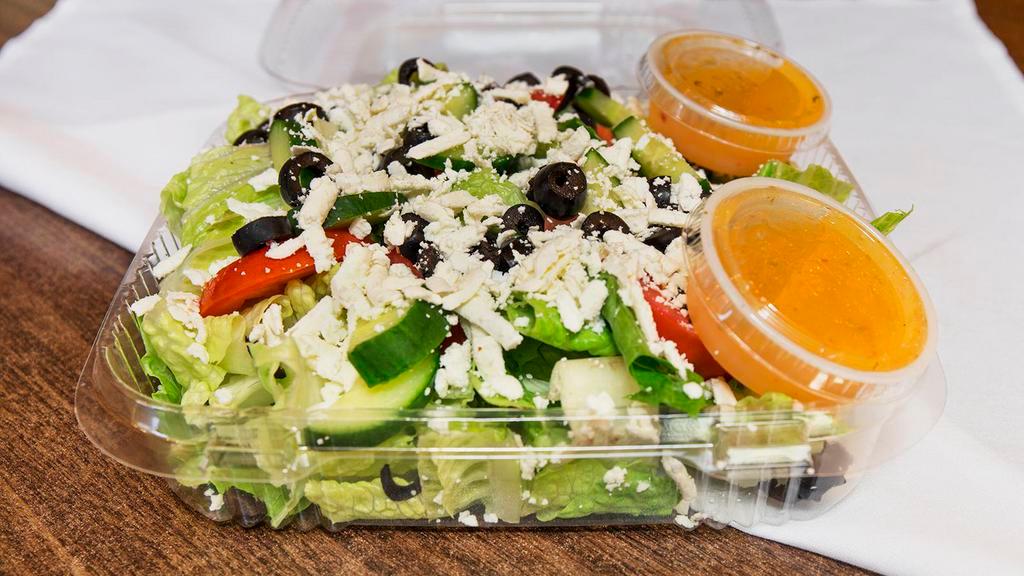 Greek Salad · Lettuce, black olives, Feta cheese, cucumber and tomatoes.