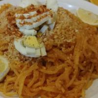 Pancit Palabok · Thick rice noodles tossed in cream of mushroom  sauce, ground pork, tofu, topped with eggs, ...