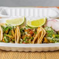 TACOS  · Choice of meat, with cilantro, onion, and spicy or mild salsa.