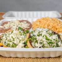 Mexitamalli's Sopes Combination Plate Lunch · Fresh hand-made corn tortilla with black beans, your choice of chicken or poblano peppers. F...