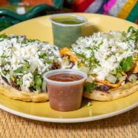MEXITAMALLI SOPES · Choice of meat, Fresh handmade corn tortillas topped with your choice of black beans, red sa...