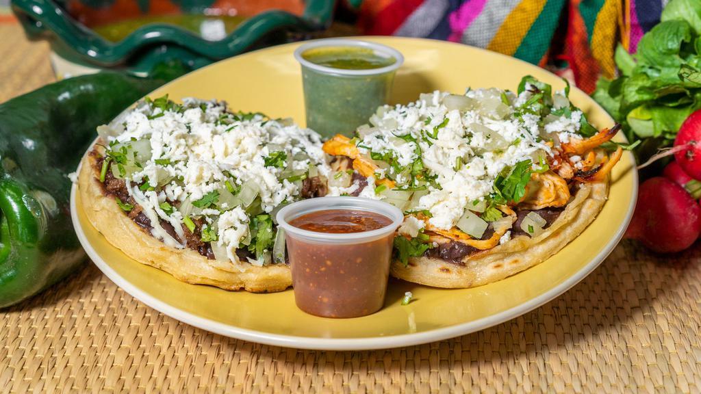 MEXITAMALLI SOPES · Choice of meat, Fresh handmade corn tortillas topped with your choice of black beans, red sauce or green sauce, finished with queso fresco, cilantro and onions