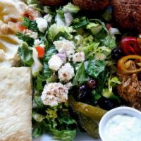 Combo Veggie Platter · lamb kabob and grilled chicken served over fresh mixed veggies with salad, pita, and your ch...