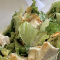 Caesar · Grilled chicken breast, romaine lettuce, caesar dressing, and Parmesan cheese.