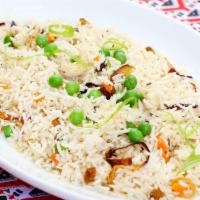 Pulao Rice · Basmati rice sautéed with cashew, raisins, peas and spices.