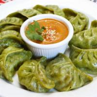 Vegetable Momo (10pcs) · Traditional Nepali Food. Fresh seasonal vegetables Minced and marinated in Nepali spices, st...