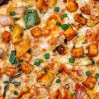 Paneer Pizza · Homemade cheese, special sauce, mixed nuts, onions, bell pepper, tomatoes & cilantro.