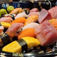 Sushi Party · Chef's choice 20 pcs sashimi, 16 pcs nigiri, tuna roll and kappa roll.