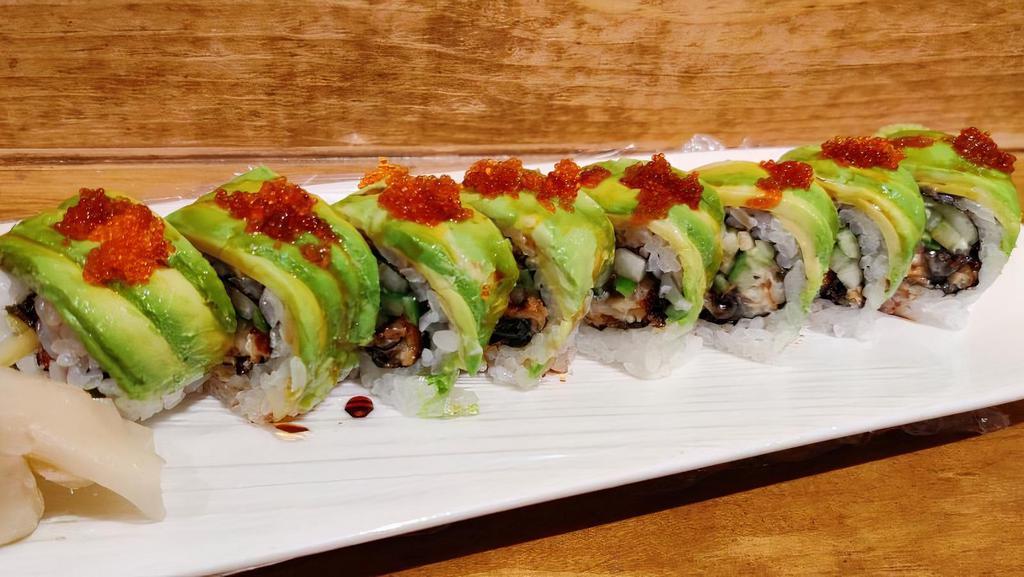 Dragon · Shrimp tempura roll topped with ecl, avocado & imitation crab meat, unagi sauce and tobiko.