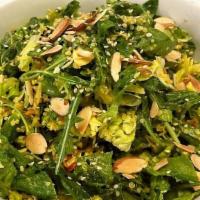 Super Green Salad · Wild arugula, little gems, shaved brussel sprouts, sugar snap peas, white quinoa, toasted al...