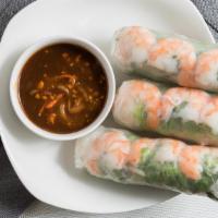 A02. Fresh Spring Rolls (3) / Gỏi Cuốn · Steamed shrimp and pork, bean sprouts, lettuce, vermicelli and mint leaves, wrapped in rice ...
