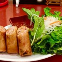 A01. Egg Rolls (3) / Chả Giò · Minced chicken, carrot, crystal noodle and vegetables wrapped, deep fried and served with pr...