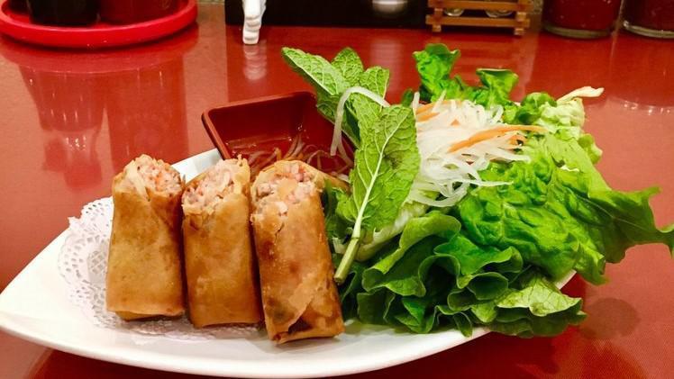 A01. Egg Rolls (3) / Chả Giò · Minced chicken, carrot, crystal noodle and vegetables wrapped, deep fried and served with prepared fish sauce.
