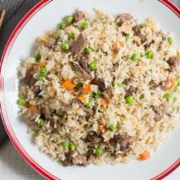 Fried Rice / Cơm Chiên · Choice of chicken, pork or beef stir fried rice with egg, green peas, corn, carrot and green...