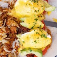 California Benedict · Sliced avocado, bacon, and fresh tomatoes on a grilled english muffin with hollandaise sauce.