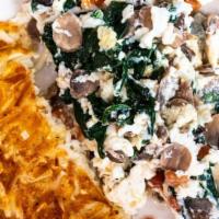 Greek Scramble · Spinach, mushrooms, tomatoes, and feta cheese egg white scramble.