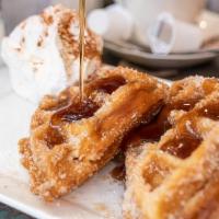 Chicken Fried Waffle · Our twist on chicken and waffles.  A waffle stuffed with our fried chicken,  then deep fried...