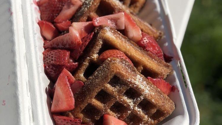 Fresh Strawberry Chuuro Waffle · Deep fried belgian waffle covered in cinnamon and sugar.  Served with whipped cream.  Topped with fresh organic strawberries.