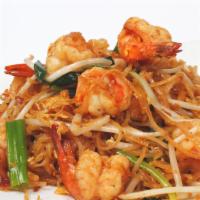 29. Pad Thai Shrimps · Stir-fried rice noodles with 6 shrimps, egg, tofu, bean sprouts and ground.