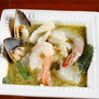 20. Green Sea · Combination of seafood in a green curry with coconut milk, peas, bamboo shoot, sweet basil, ...