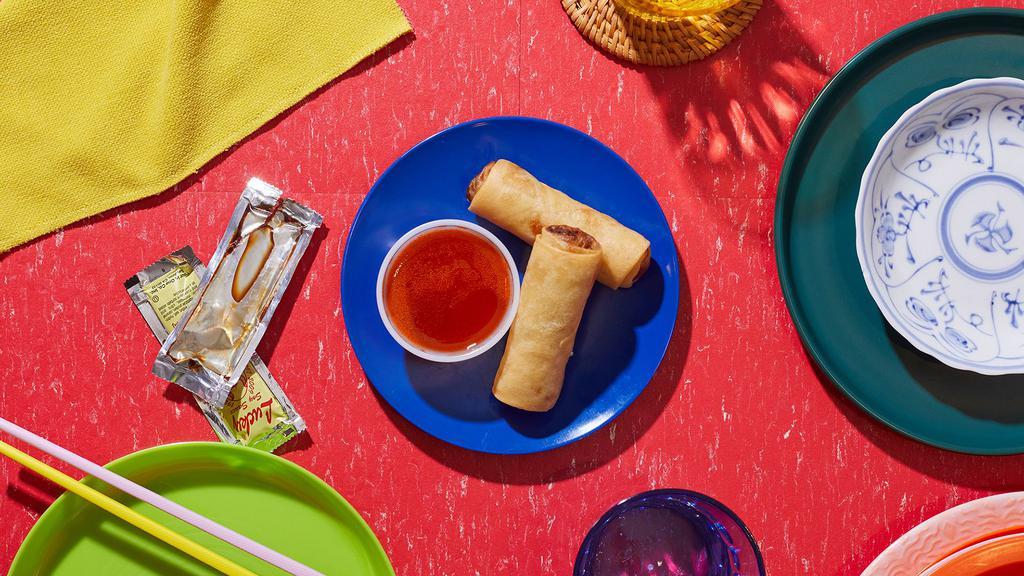Vegetable Egg Rolls · Mixed vegetables wrapped in a spring roll skin. Served with choice of peanut or sweet and sour sauce on side.
