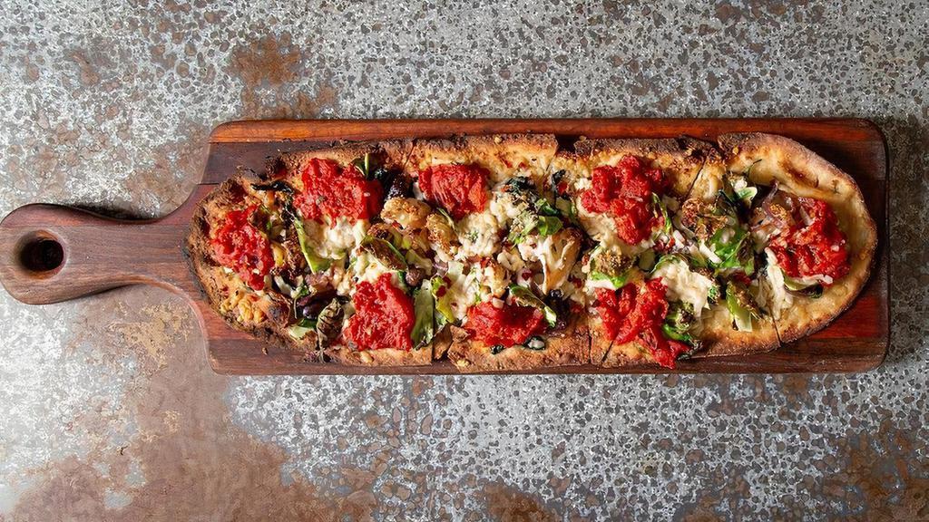Ultimate Veggie · cauliflower, brussels sprouts, spinach, tomato, olives, red onion, parmesan, fontinella, margherita sauce, red pepper flakes
