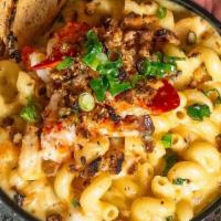 Lobster Mac & Cheese - Available 3Pm - 9Pm · maine lobster, shrimp, applewood smoked bacon, sharp cheddar, truffle, black sesame crostini