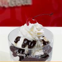 Regular Sundae · Two scoops of vanilla with hot fudge, whipped cream topped with a cherry.  Feel free to chan...