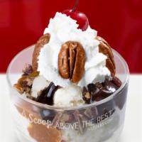 Turtle Sundae · Vanilla ice cream, hot fudge, caramel, whole pecans, whipped cream and a cherry. Extras and ...